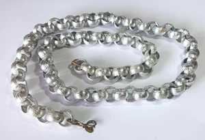 Collana vintage CADORO 31": decine di piccoli anelli larghi testurizzati tono argento - Foto 1 di 9