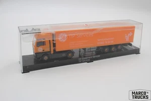 AWM MAN TGA XXL refrigerated semi-trailer, orange "GE TIP Services" 1:87 /AW2980 - Picture 1 of 1