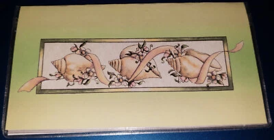 Cubierta de chequera hecha a mano y multicolor vinilo, conchas marinas con amarillo y verde Foto 1 de 2