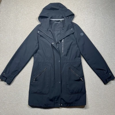 Chaqueta para mujer Calvin Klein talla pequeña con capucha estilo lluvia/rompevientos cremallera/a presión Foto 1 de 4