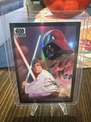 2022 TOPPS STAR WARS GALAXY CHROME BASE REFRACTOR THE DARK LORD AND A NEW HOPE - Image 1 of 4