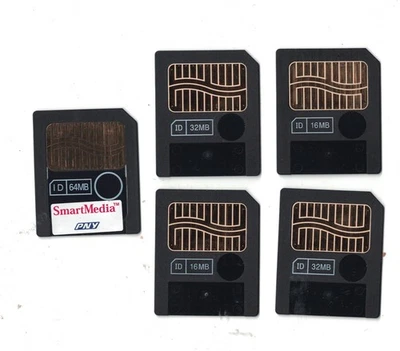 Five Smart Media memory cards two 16MB,  two 32MB , one 64MB,+ Fuji case for 4 - Image 1 of 4