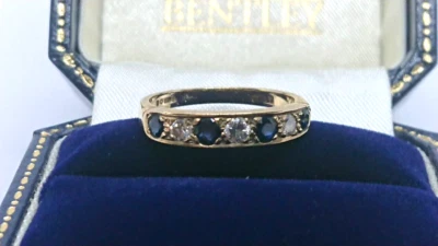 Anillo vintage de media eternidad de oro de 9 quilates y diamantes de 0,20 quilates 1982 - talla M 1/2 Foto 1 de 4