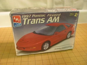 AMT 1997 Pontiac Firebird Trans Am kit modellino scala 1:25 #8223 nuovo sigillato - Foto 1 di 7