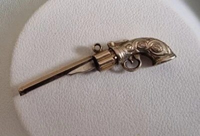 Antiguo oro plata metal revólver pistola reloj bolsillo enrollador llavero cadena pentante Foto 1 de 4