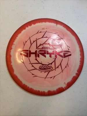 Innova Disc Golf Halo Star Shryke 173g Pink Red Swirly Distance Driver Disc  - Image 1 of 2