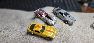 ROAD CHAMPS AMARILLO MAZDA RX7, PLATA CHEVROLET CORVETTE Y PLATA TRANSMISIÓN AM Foto 1 de 4