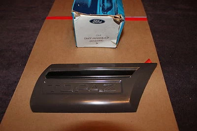 NOS 1988 MERCURY TOPAZ RH FRONT FENDER MOULDING E86Y 16A038 CP - Image 1 of 3