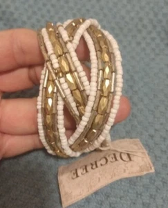 Brazalete elástico Decree dorado con cuentas, blanco roto vintage nuevo con etiquetas - Imagen 1 de 7