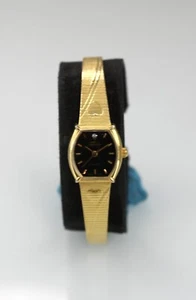 Montre femme Faberge acier inoxydable doré pile étanche quartz noir - Photo 1 sur 6