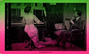Postcard Lady playing piano Man listening intermission - Picture 1 of 2