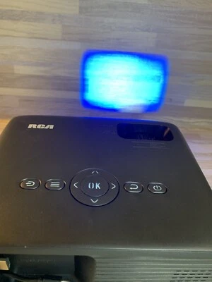 RCA RPJ280 1080P Home Theater Projector, Streaming Stick Ready - Image 1 of 4