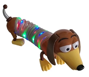 Toy Story Disney Parks Light Up Slinky Hund blinkende farbige Spulen Pixar Batterie - Bild 1 von 20