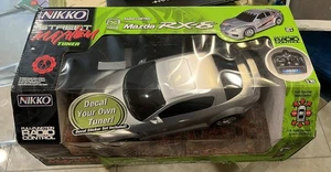 NIKKO STREET MAYHEM TUNER “ MAZDA RX-8 “ 1:16 SCALE RADIO CONTROLLED CAR NEW - Picture 1 of 3