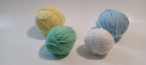 4 SOFT PASTEL YARN BALLS: BLUE 2.2 oz, GREEN 1.5 oz, WHITE .9 oz, YELLOW 2.3 OZ. - Picture 1 of 1