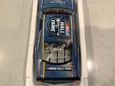 DAVID PEARSON / MOORE / JARRETT / ALLISON AUTOGRAPHED 2011 NHOF DIECAST & CARDS - Image 1 of 4