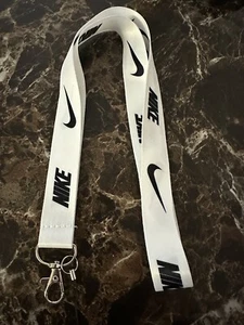 Nike con correa para el cuello llavero con insignia de identificación teléfono anime cordón - Imagen 1 de 1