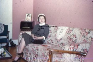35MM Slide 1950s Kodachrome Red Border Woman Posing On Couch With Radio In Back - Picture 1 of 1