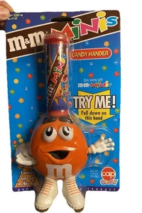 Vintage M&M Orange Guy Mini Süßigkeiten Handspender werkseitig versiegelt 1990er #4750 - Bild 1 von 3