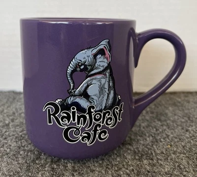 Taza púrpura Rainforest Café TUKI Makeeta Loves mantequilla de maní elefante de colección 2000 Foto 1 de 4