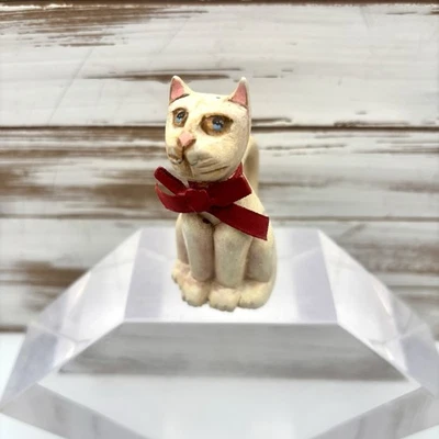 Estatuilla de Navidad de gato blanco de corcho de madera tallada Foto 1 de 4