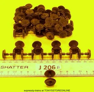 J206B)BULK BONUS BUY jouef spares 50x wheeled loco axles bronze app unknown - Picture 1 of 1