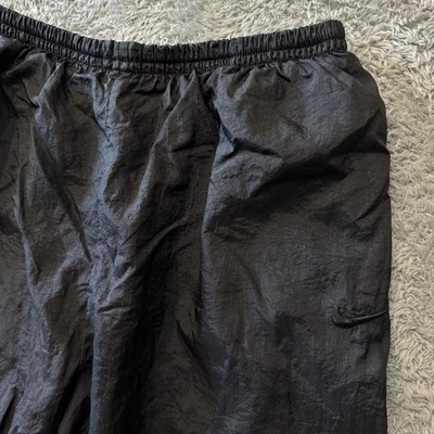 Pantalones deportivos vintage Nike forrados de lana para niños años 90 talla XL 16-18 triple negro Foto 1 de 4