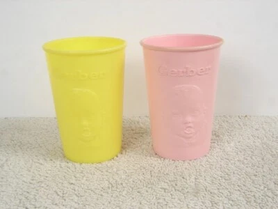 Lote de 2 vasos de plástico vintage Gerber Baby rosa y amarillo Foto 1 de 4