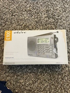 ETON E100 FM STEREO AM SW WORLD BAND RECEIVER 200 MEMORY PRESETS RADIO - Picture 1 of 6