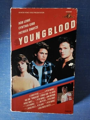 YOUNGBLOOD PATRICK SWAYZE ROB LOWE KEANU REEVES VHS BIG BOX 1986 1ST ED 1986 MGM - Image 1 of 4