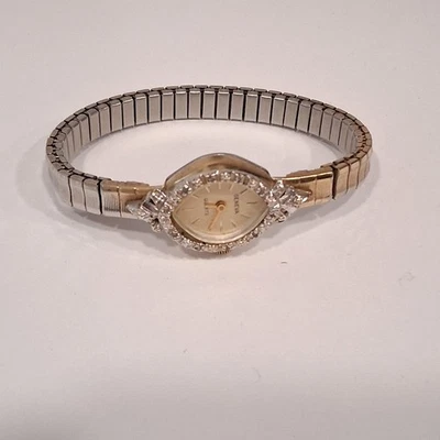 Relógio feminino Vinatge Genebra moldura de diamante tom dourado pulseira elástica oval não testada - Imagem 1 de 4