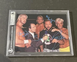 THE FOUR HORSEMEN SIGNED AUTOGRAPHED 8.5X11 PHOTO BECKETT BAS AUTHENTIC - Picture 1 of 4