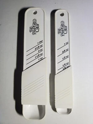 Lote de 2 cucharas medidoras ajustables The Pampered Chef Foto 1 de 3