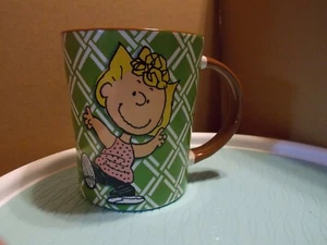 PEANUTS SALLY GIBSON OVERSEAS INC. MUG BROWN GREEN - Picture 1 of 3