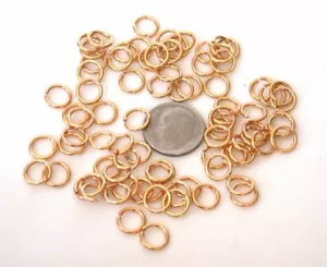 ONE HUNDRED TEN 8mm ROUND GOLD PLATED JUMP RINGS CF48 - Picture 1 of 1