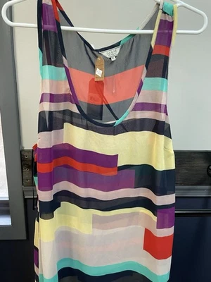 Blusa Guess transparente sin mangas de gasa con estampado geométrico para damas - Talla XL Foto 1 de 3