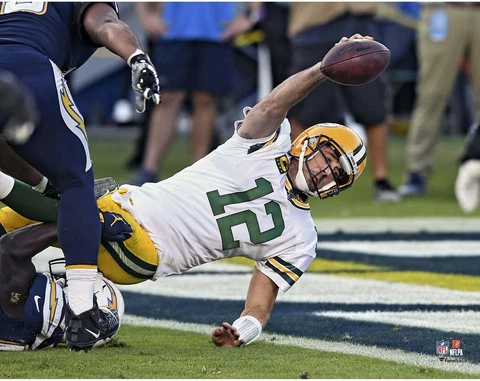 Aaron Rodgers Green Bay Packers Unsigned Scoring Touchdown Photograph Cover