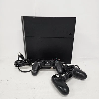 Sony PlayStation 4 CUH-1215A 13.02 500GB Negro Cont. (cosm wear cont tal cual se lee) Foto 1 de 4