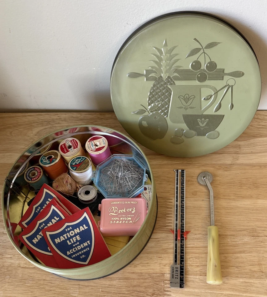 Lata de oliva Chicago de metal de 7 pulgadas con rueda de rastreo Dritz y suministros de costura Foto 1 de 4