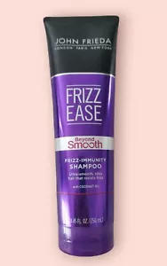 John Frieda Beyond Shampoo liscio Frizz Ease Frizz immunità olio di cocco 8,45 once - Foto 1 di 2