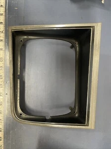 1981 - 1987 PONTIAC T1000 Right Hand Headlight Trim 1009614 - Picture 1 of 11