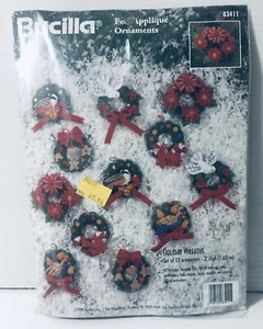 #83  Bucilla Holiday Wreaths Ornament Felt Applique Kit 83411 - Makes 12 - Picture 1 of 2