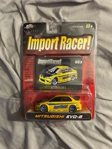 1:64 Jada Import Racer Mitsubishi EVO-8 Yellow 2003 - Picture 1 of 2