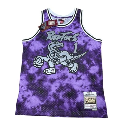 Camiseta deportiva Mitchell and Ness Toronto Raptors Tracy McGrady Reflectante Galaxy Mediana Foto 1 de 4