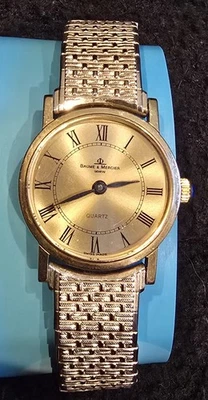 Relógio de quartzo Baume & Mercier ouro amarelo 18K Geneve  - Imagem 1 de 4