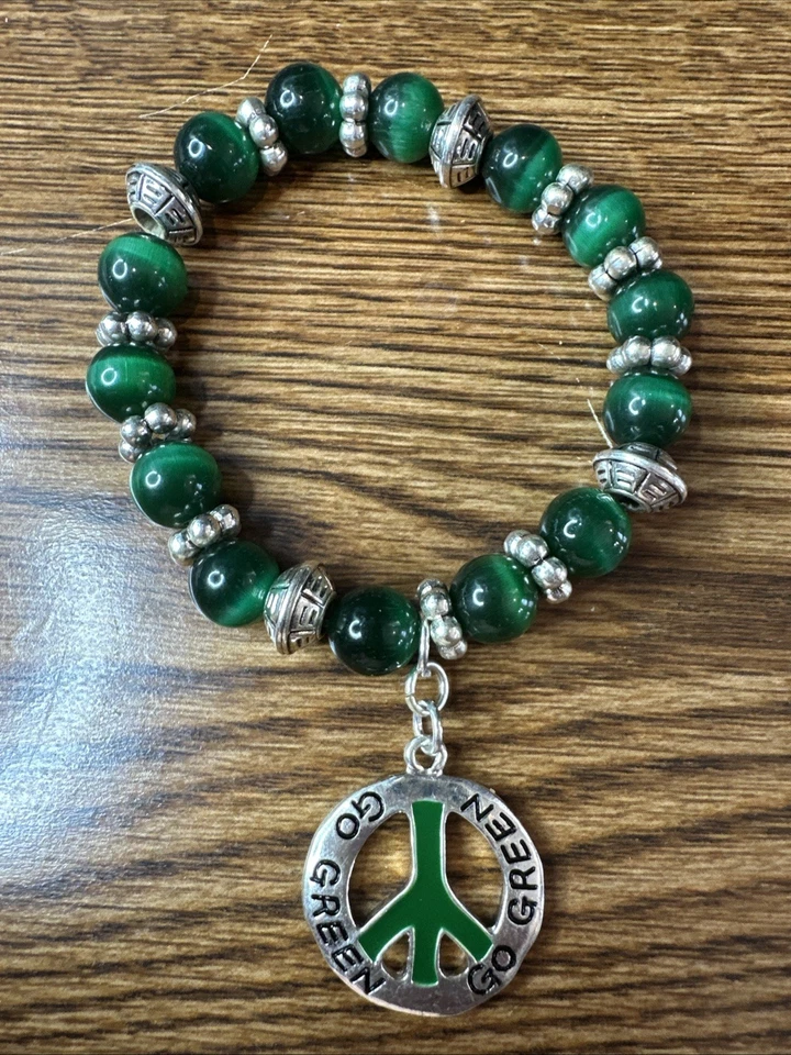 Pulsera colgante verde go sin estiramiento dimensión interior de 2" Foto 1 de 3