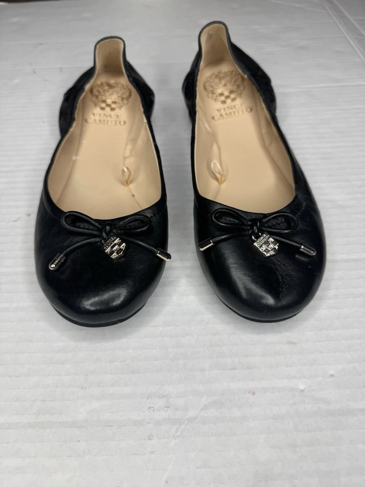VINCE CAMUTO Black Leather  Ballet Flats Shoes w/bow Size 7.5 Gold Accent Logo - Image 1 of 4