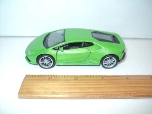 Welly Lamborghini Huracan LP 610-4 grün 1:64 Spielzeugauto Pull Back, Türen öffnen 4,5" - Bild 1 von 6