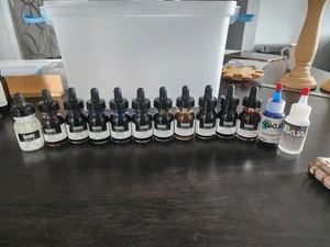 11 Flaschen Liquitex Acrylfarben unbenutzt plus Akua Mischmedium usw. - Bild 1 von 5