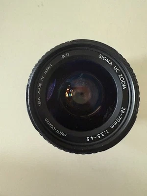 Объектив Sigma UC Zoom 28-70 мм 1:3.5-4.5 52 мм - Изображение 1 из 3